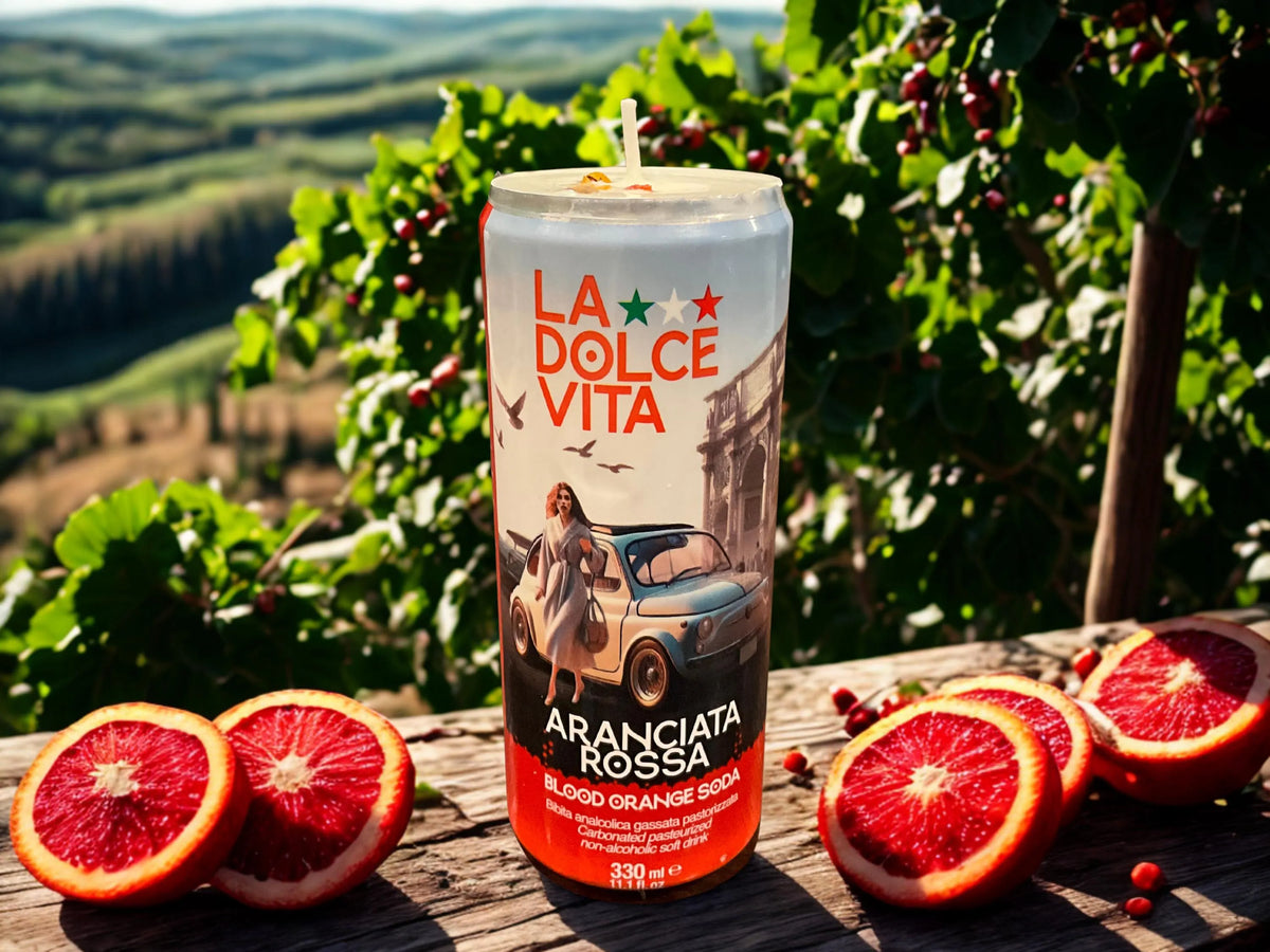 Bring a touch of Italian charm to your home with unique, hand-poured soy candles with light citrus scent crafted in repurposed Italian cans